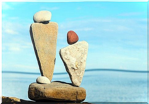 Two stone figures in the sea