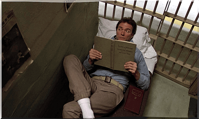 Prisoner reading a book