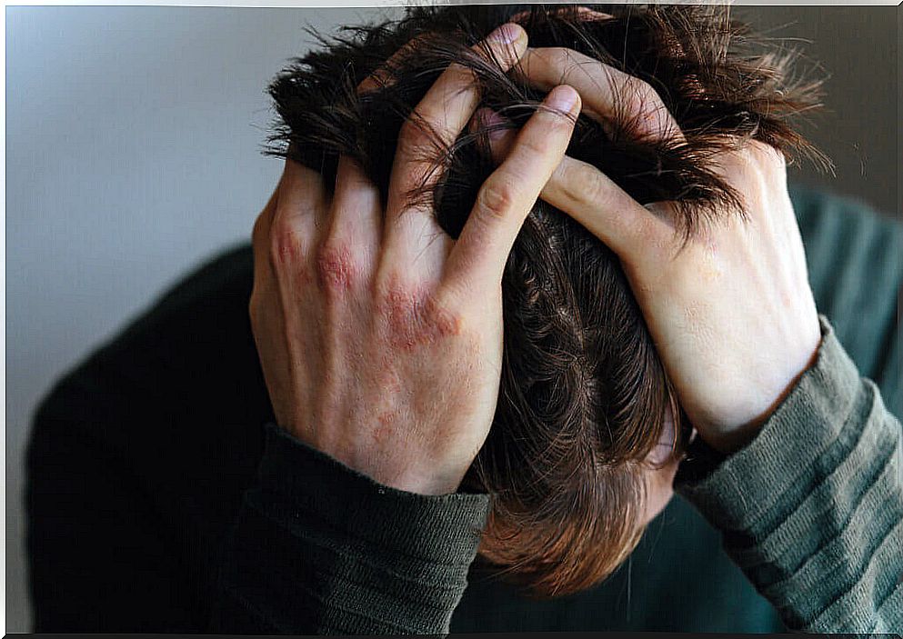 Man overwhelmed by extreme tiredness from anxiety