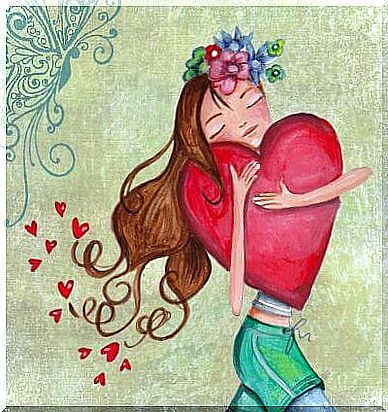 Happy girl hugging a heart