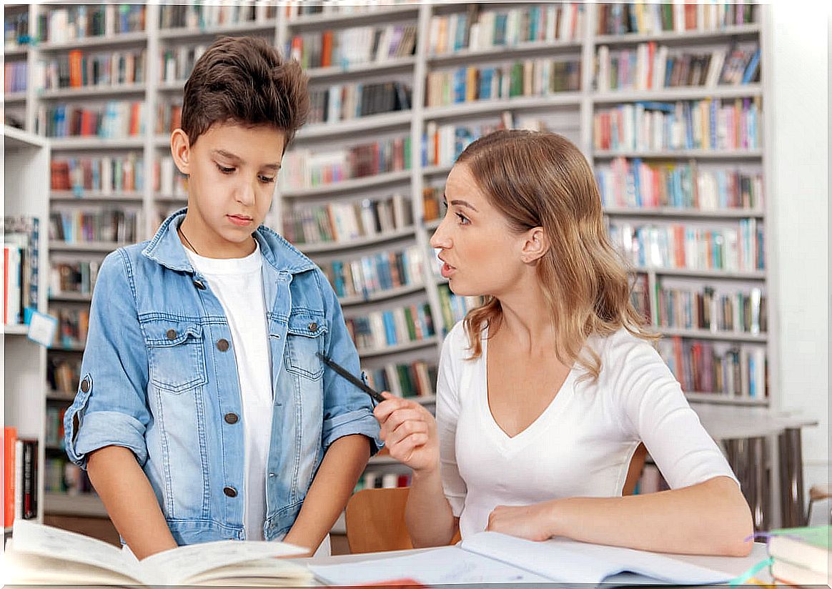 Teacher talking to a student