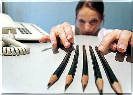 Woman sorting some pencils 