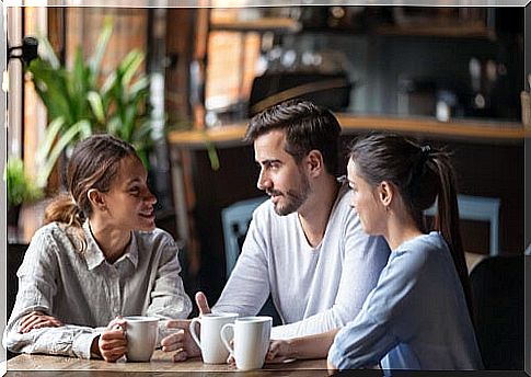 Friends talking in a coffee shop