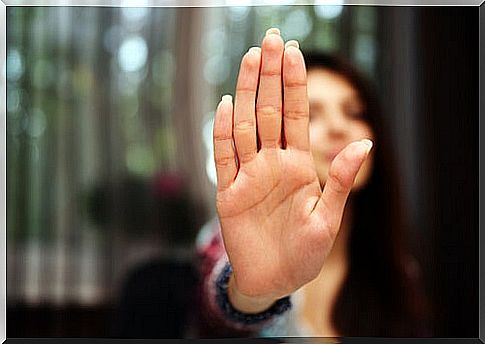 Woman with raised hand