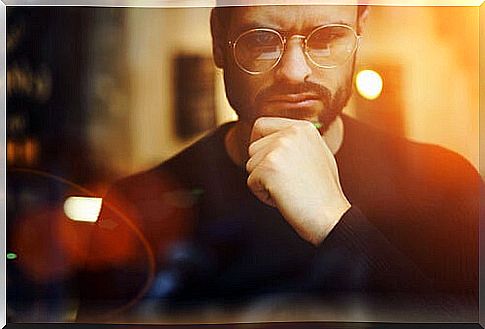 Man with glasses thinking mental strategy