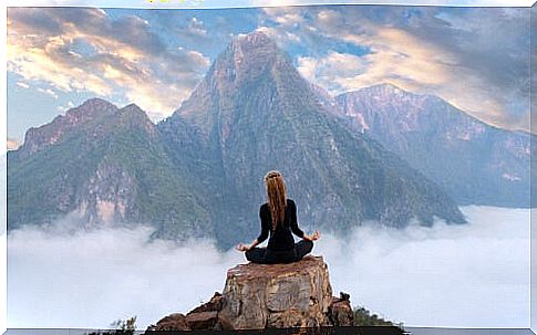 Girl in mountain thinking about winning in life