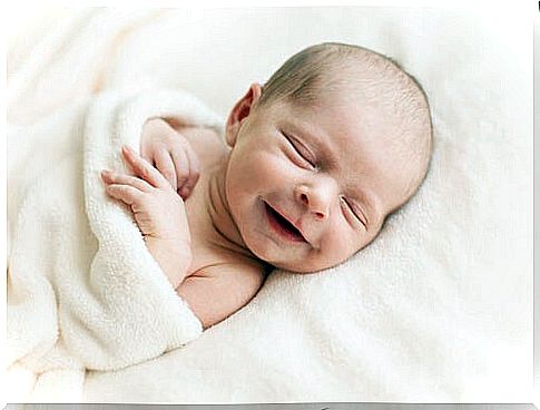 Newborn smiling