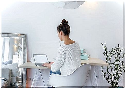 Woman at a minimalist desk