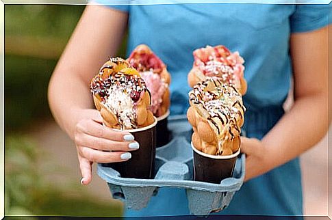 Woman with a box full of ice creams