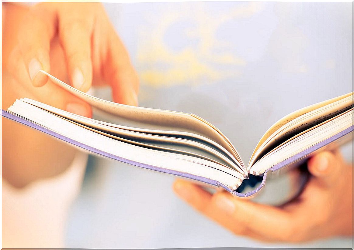 Woman looking at a book